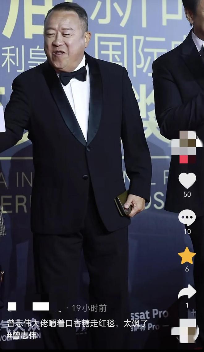 嚼口香糖与金沙总裁骑旋转木马挺幼稚m6米乐曾志伟澳门参加电影节台上(图10)